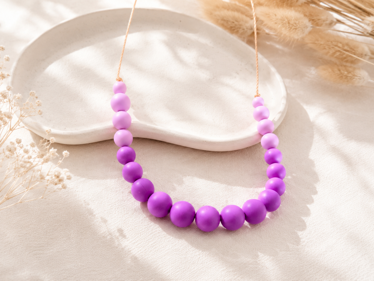 Collier dallaitement et de portage orchidée
