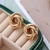 Boucles d'oreilles tourbillon acier inoxydable doré femme 974 réunion idée cadeaux