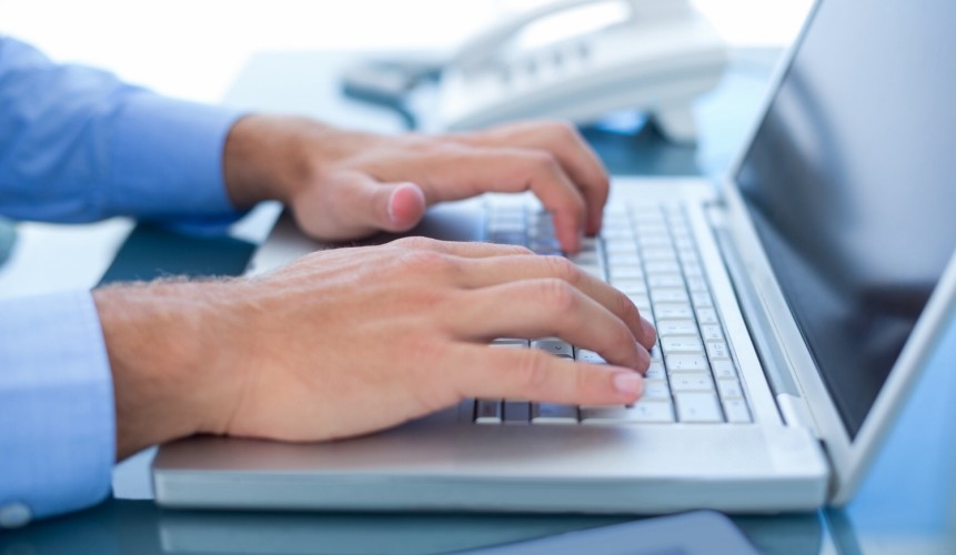laptop hands blue