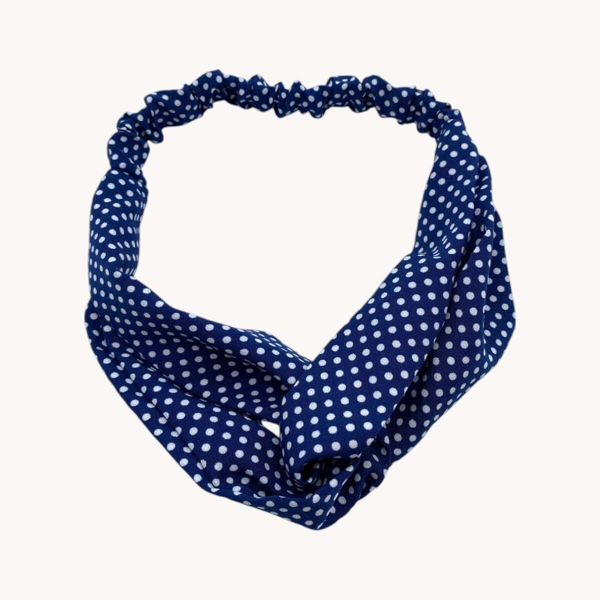 Bandeau cheveux bleu marine à pois blancs