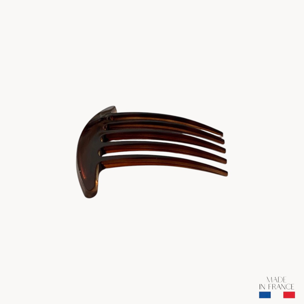peigne-marron-injecté-5-dents-3-Photoroom