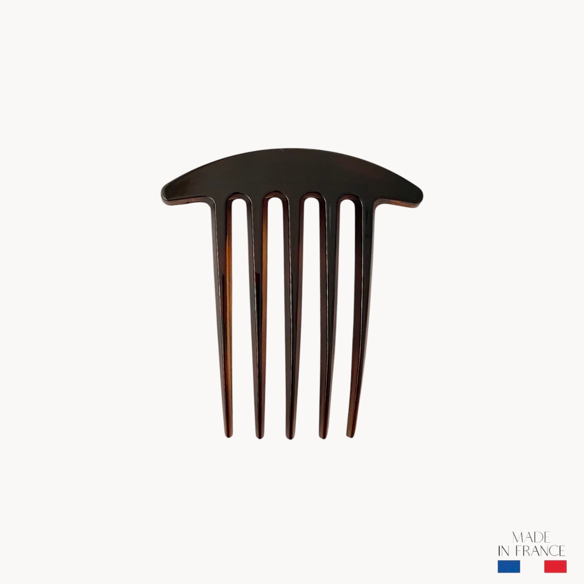 peigne-marron-injecté-5-dents-Photoroom