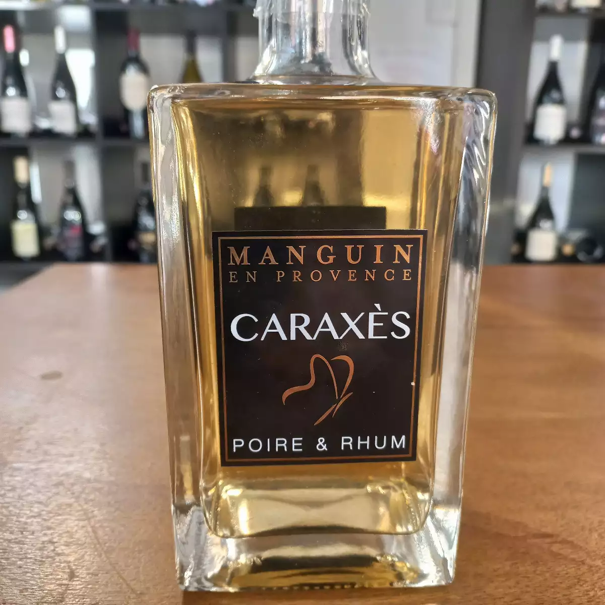 1733843526-distillerie-manguin-caraxes-jpeg