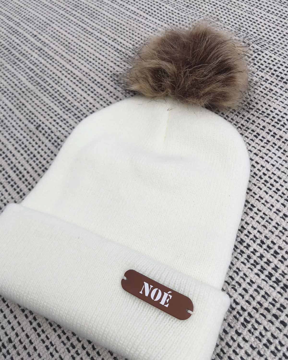 bonnet doux laine et simili cuir pompon fausse fourrure