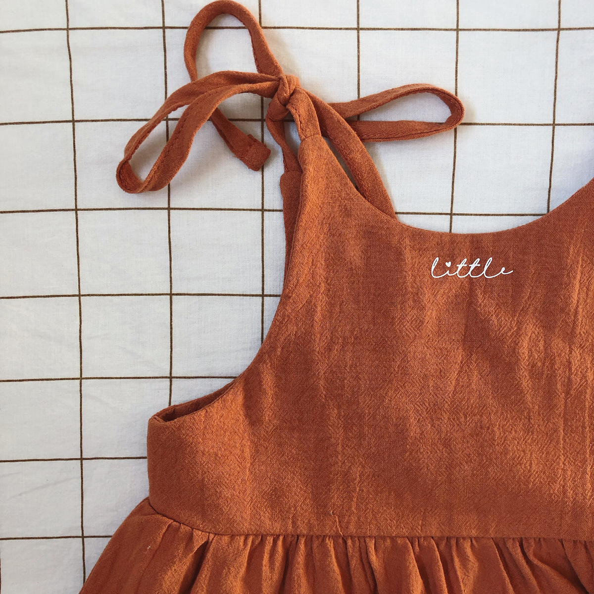 robe oversize avec poches et liens noués