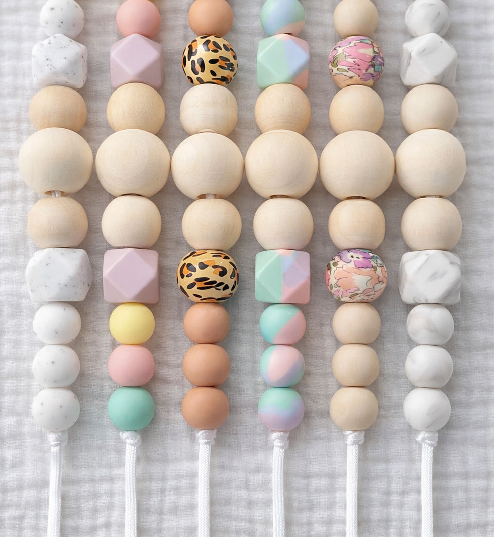 colliers-portage-bebe-silicone-bois-collection-multicolore-pastel-leopard-marbre-liberty-alignes