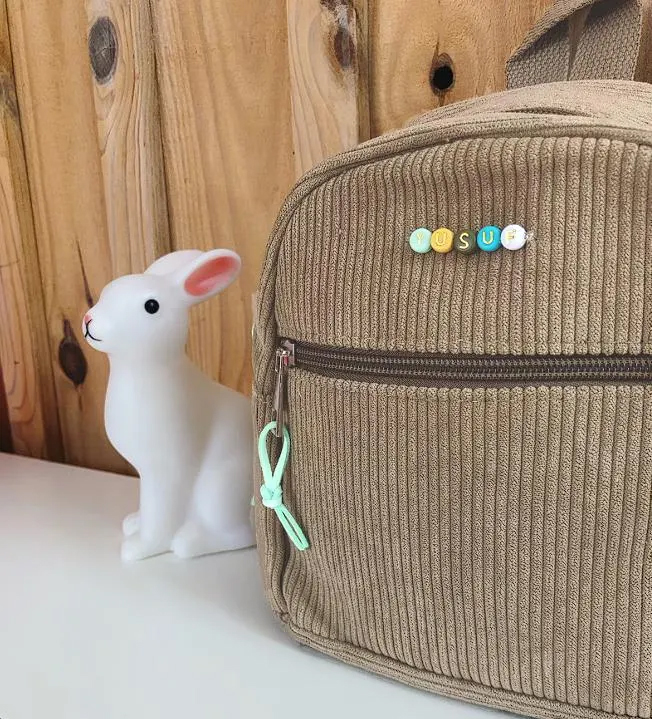sac à dos beige prénom garçon