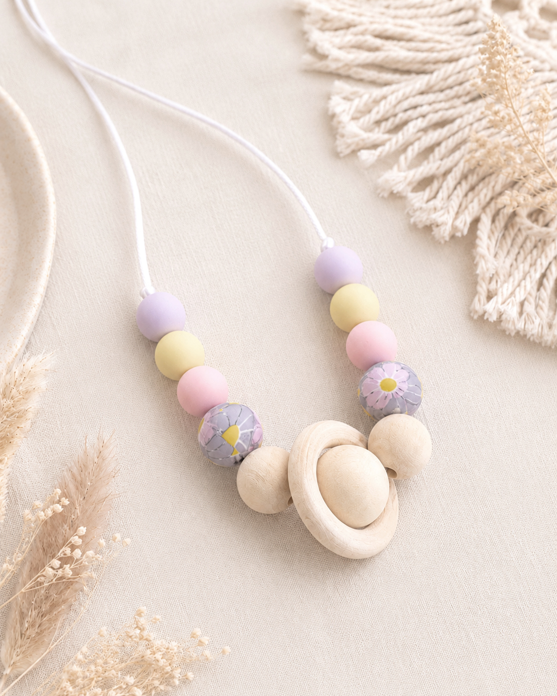 colliers-portage-bebe-silicone-bois-multicolore-pastel-fleuri