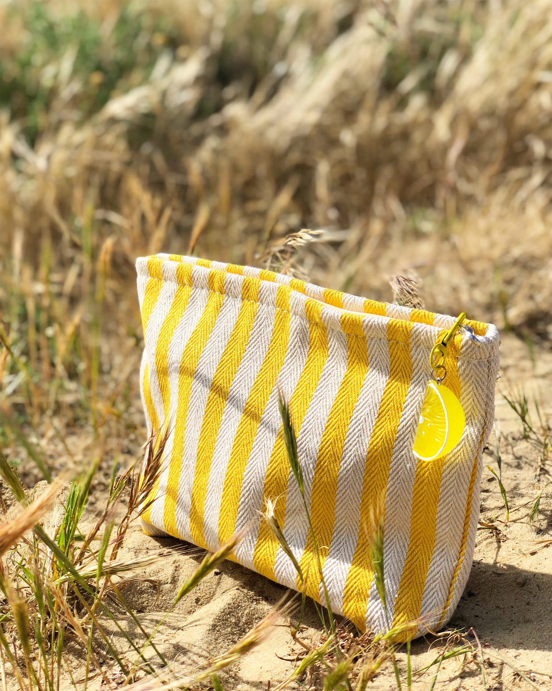 joli trousse maquillage accessoires jaune à rayures