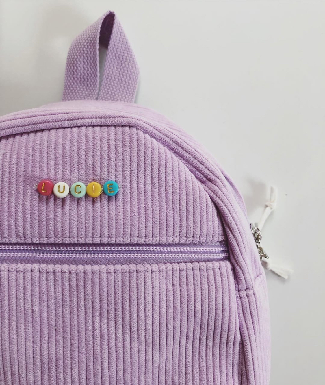 sac a dos parme fille prenom multicolore