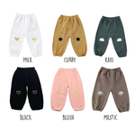 couleur pantalon de plage enfant genouillères symboles