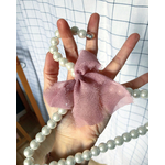 cintre perle nacré avec noeud rose poudré