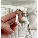 lien blanc sur fermeture éclair sac poussette