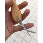 lien argenté paillettes brosse bois