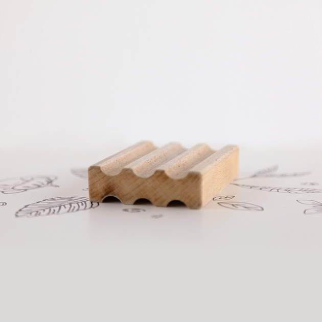 Porte-savon noir en bois pétrifié