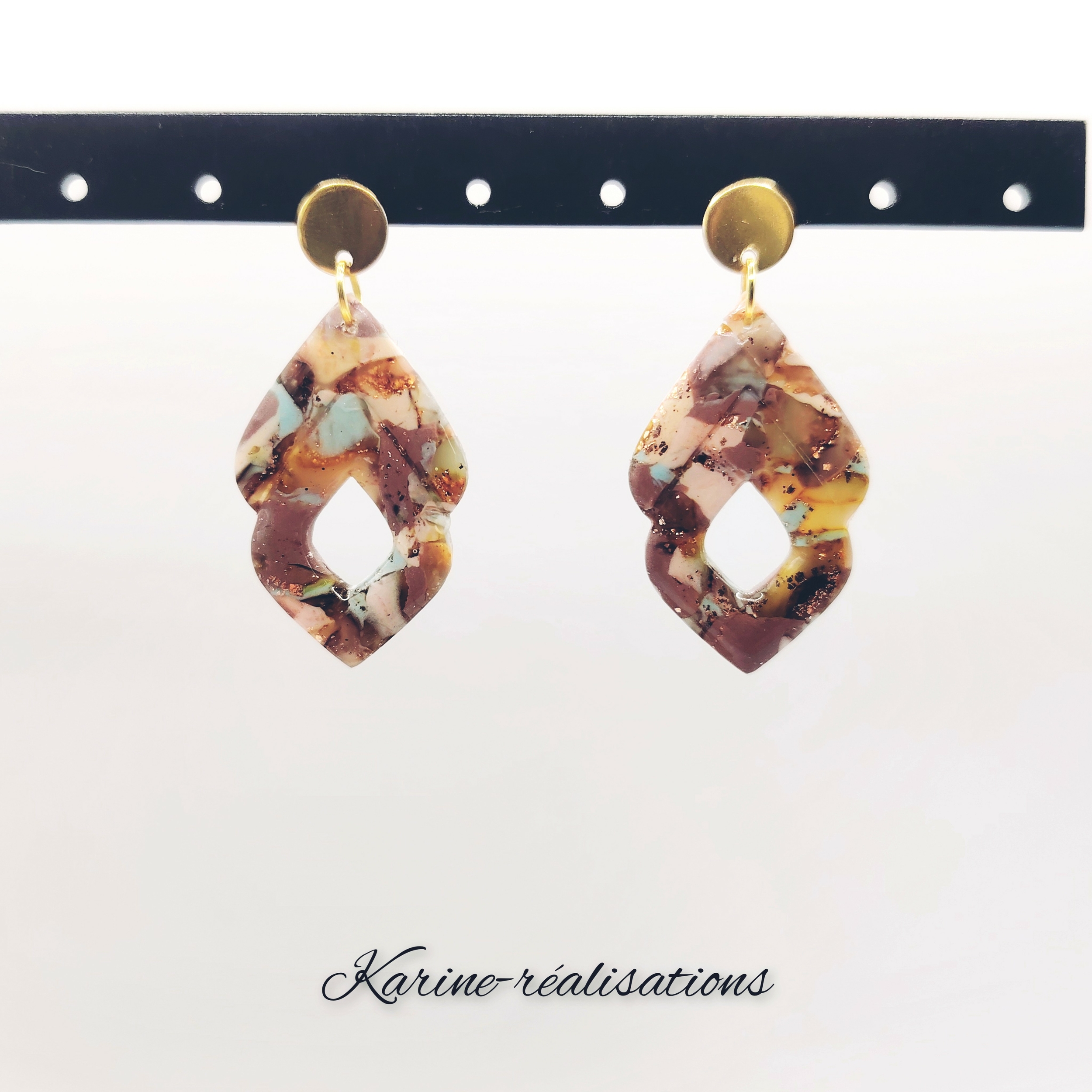 boucles-oreilles-losanges-evides-effet-granit-dore.jpg