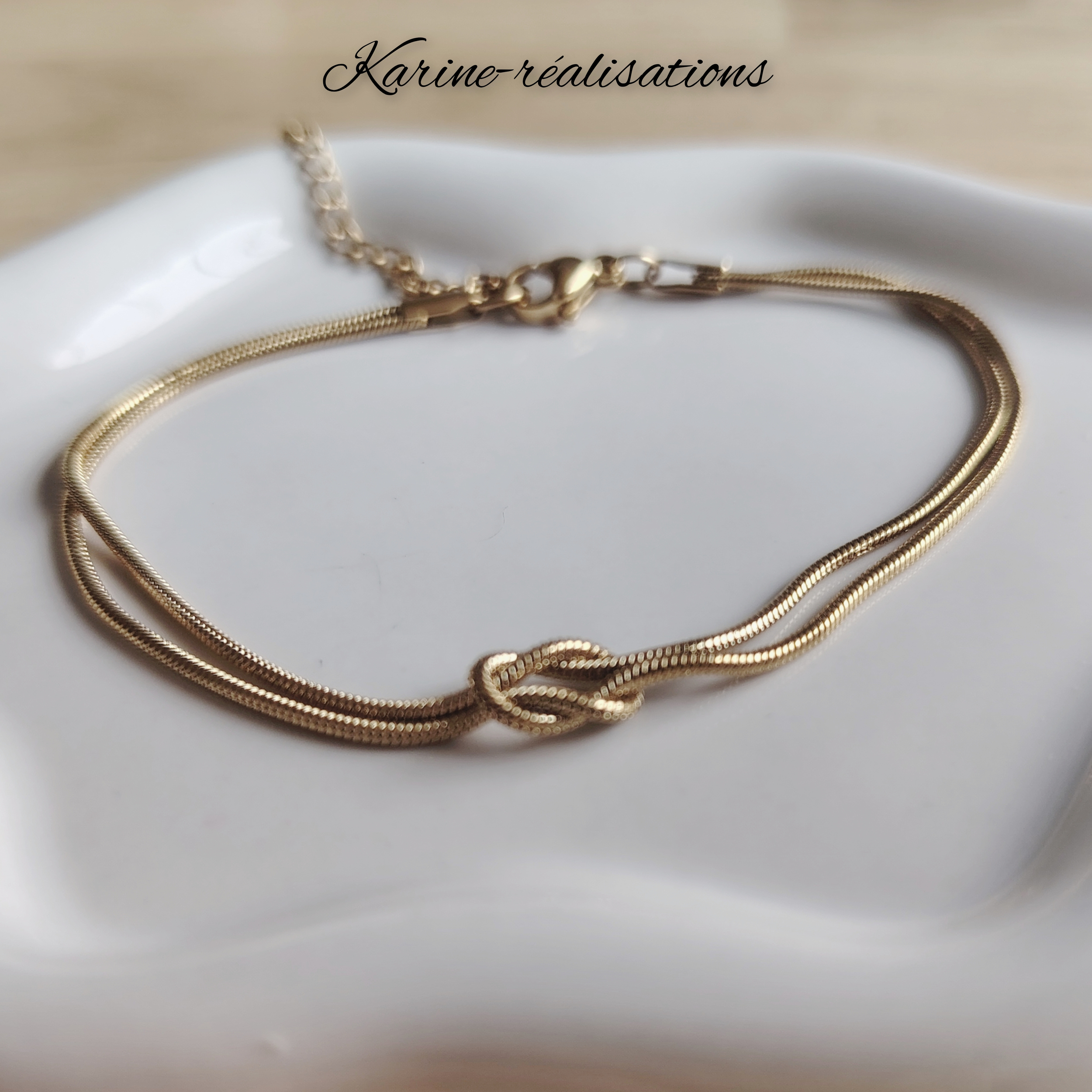 bracelet-double-rang-acier-inoxydable-dore-maille-serpent-noeud-central2