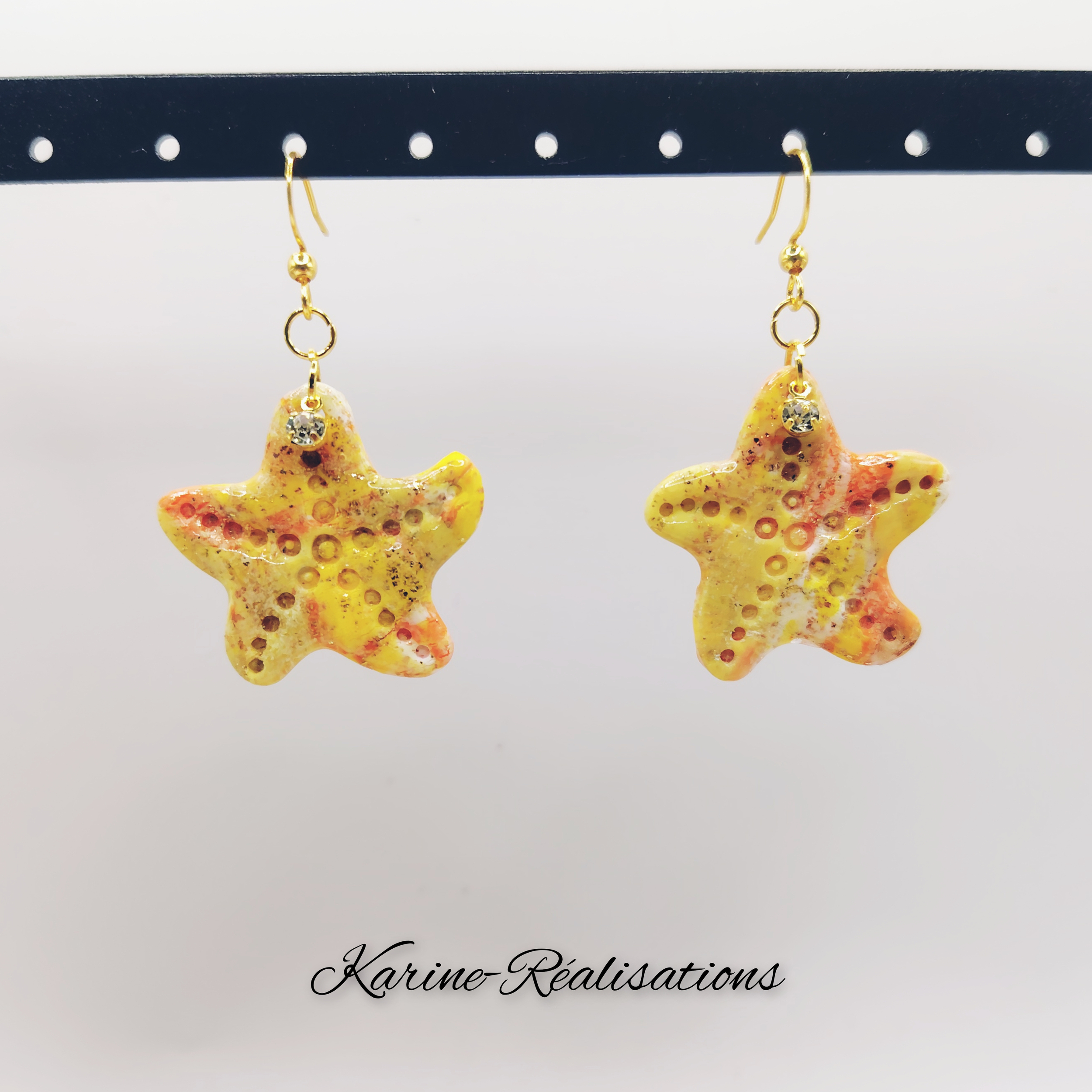 Boucles-oreilles-etoile-de-mer-jaune-orange-artisanales