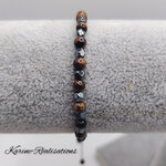 bracelet-mixte-oeil-de-tigre-hematite-ajustable-shamballa