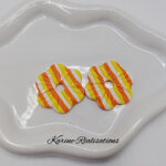pampille-fleur-rayee-orange-jaune-blanc1.jpg