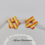 pampille-etoile-rayures-orange-jaune-blanc.jpg