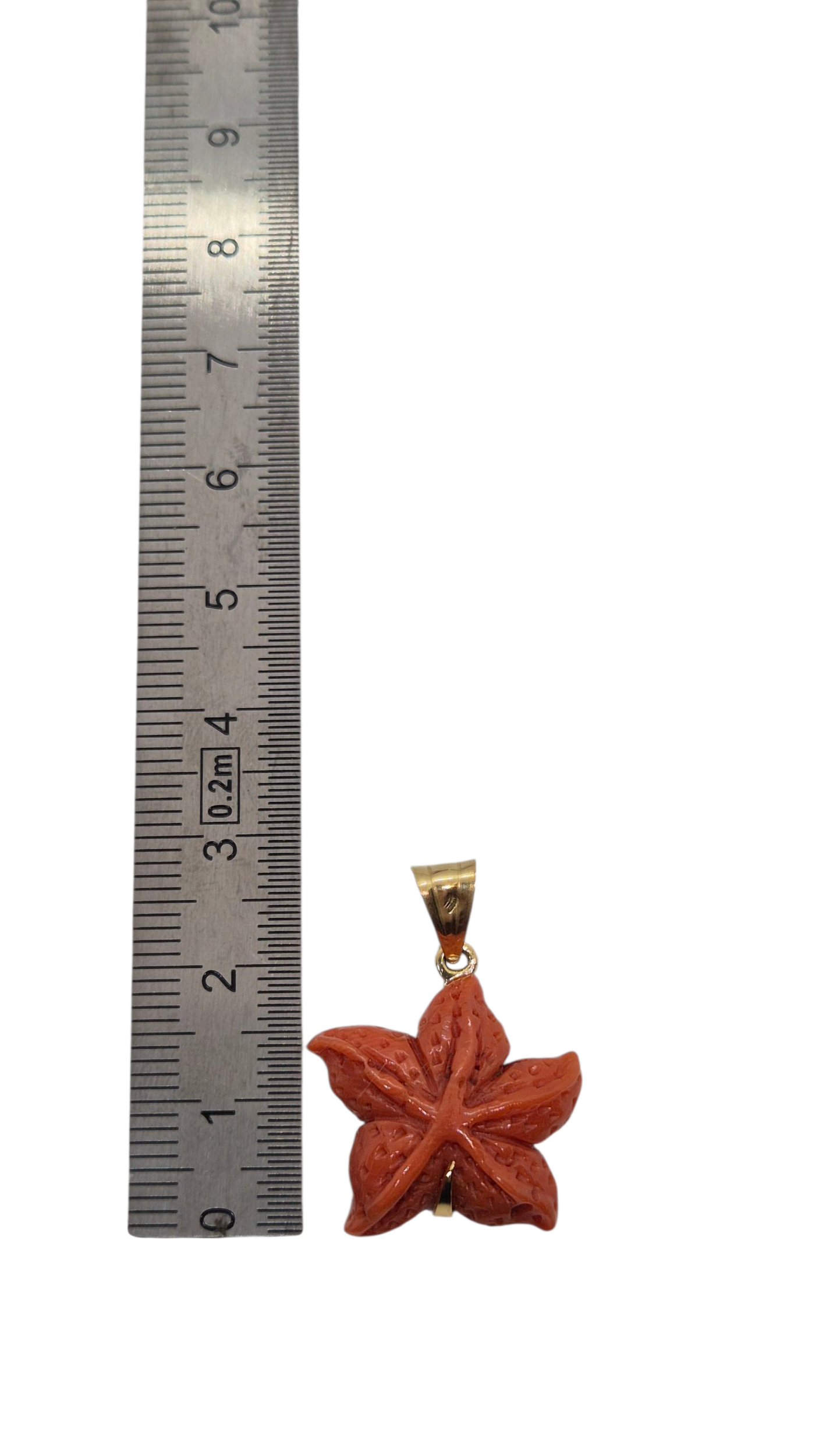 Pendentif corail étoile de mer or 18 carats
