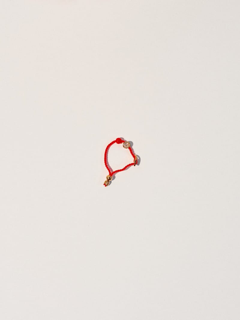 Bague ornée d’une breloque en forme de brillant plaquée or