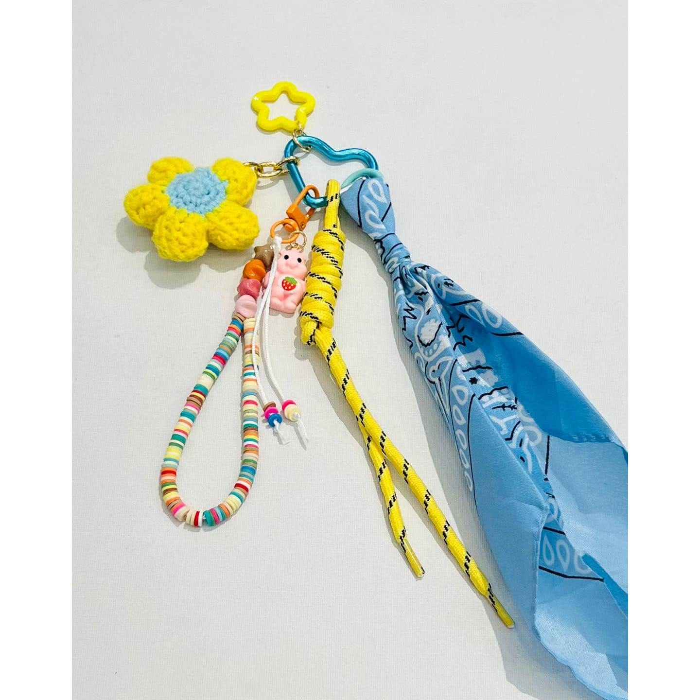 Bijou accroché au sac