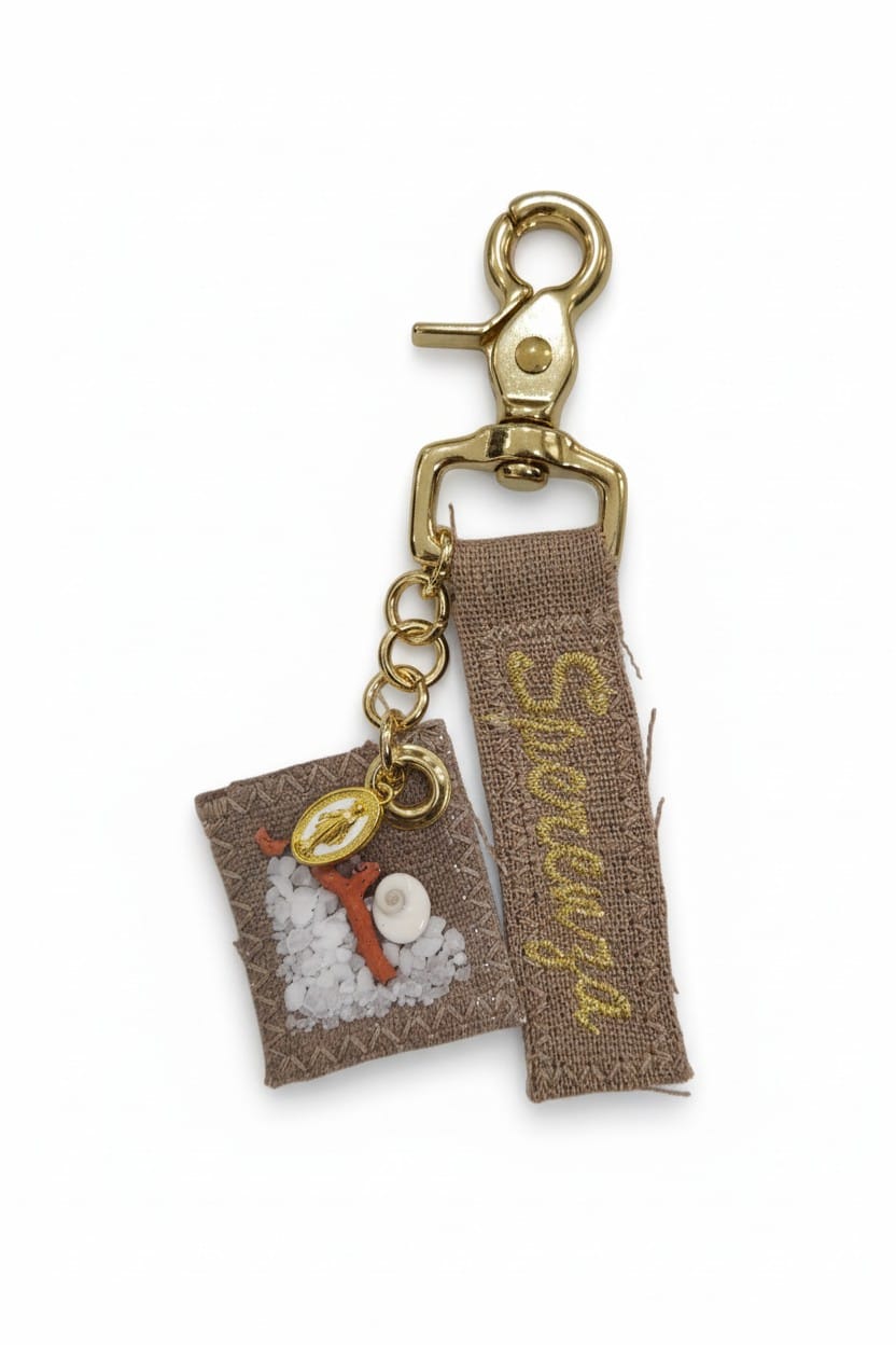 Porte clef porte bonheur pochon gros sel corail et œil de Sainte-Lucie