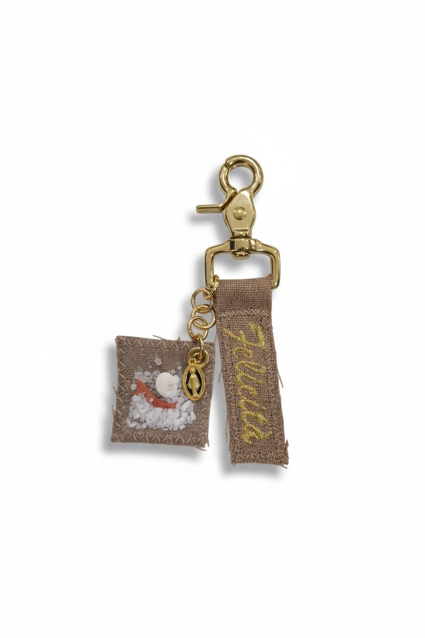 Porte clef porte bonheur œil de Sainte-Lucie et gros sel