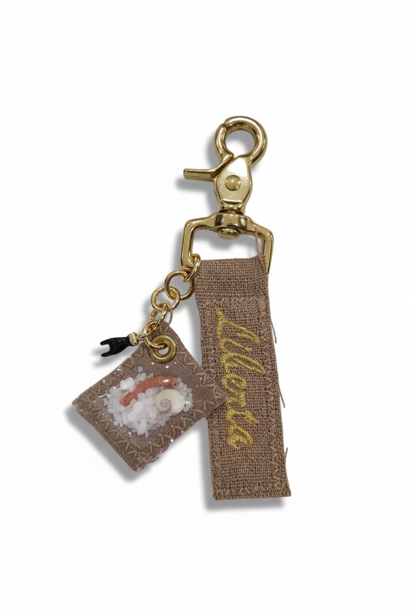 Porte clef porte bonheur  Avec pochon gros sel corail et oeil de Sainte-Lucie