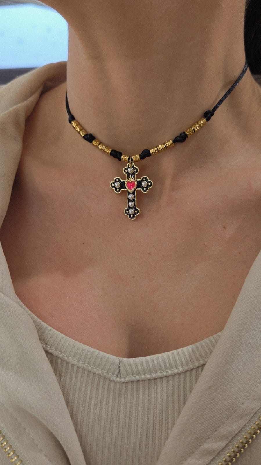 collier femme breloque symbolique