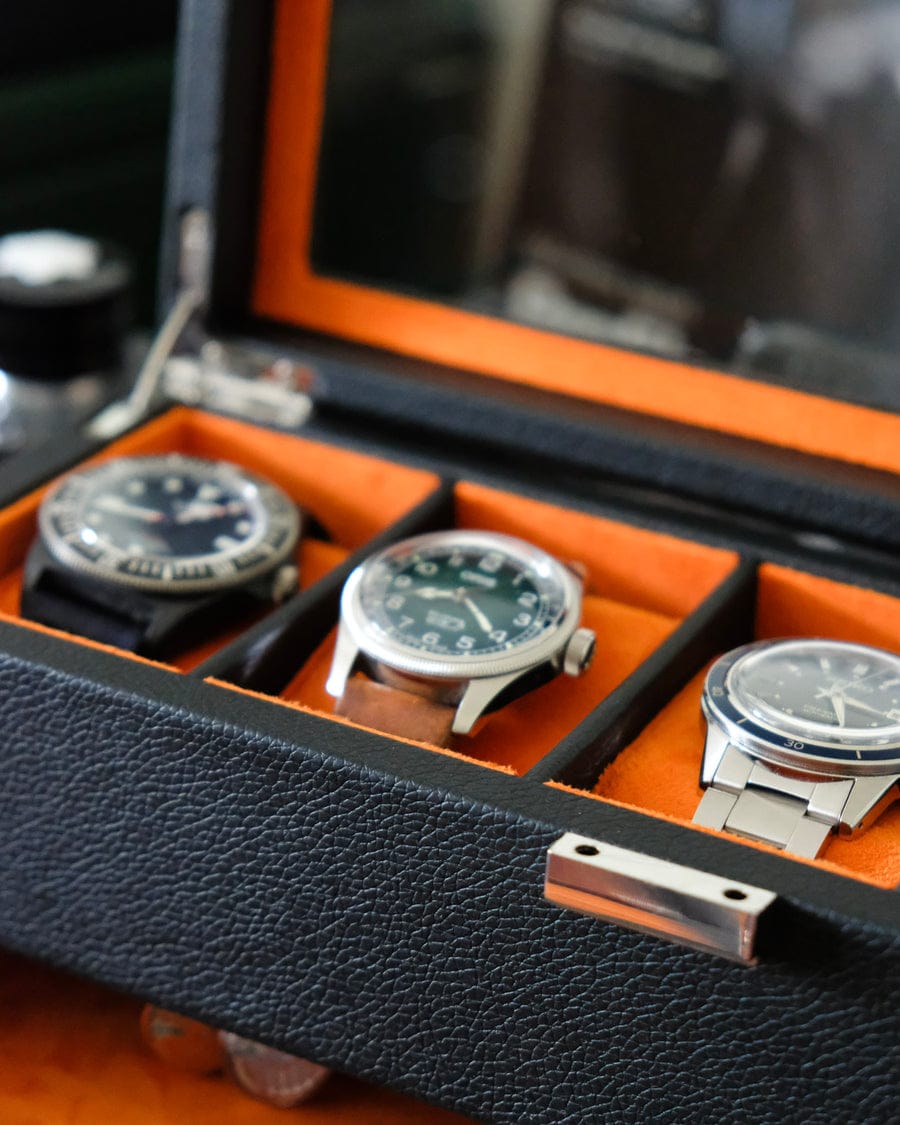 boîte à montres 5 emplacements orange et noir