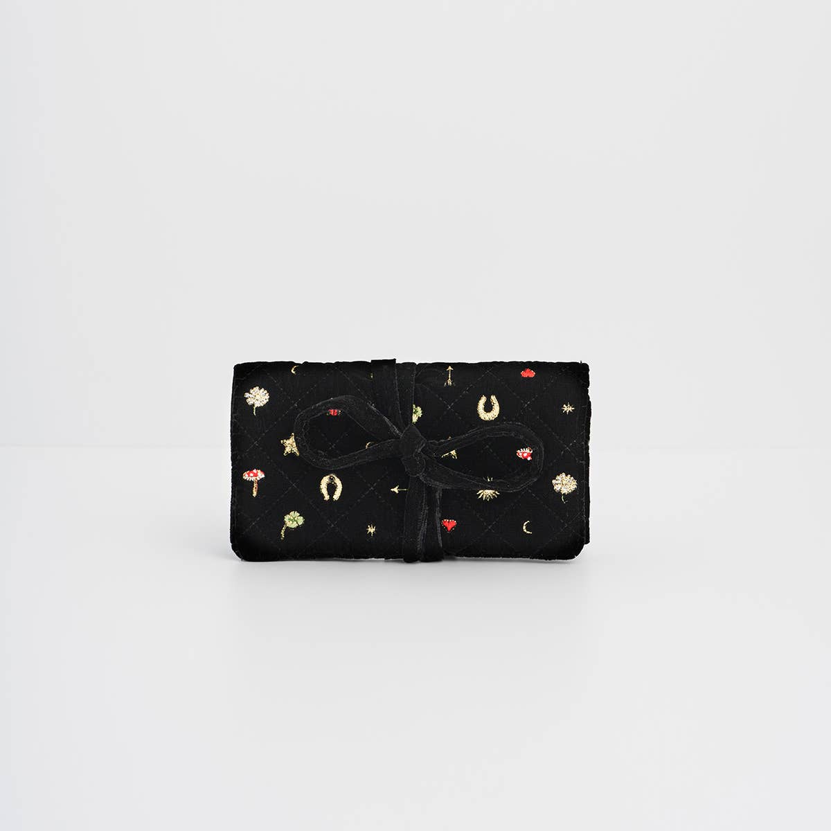 Rouleau à bijoux en velours noir matelassé avec motif brodé tendance