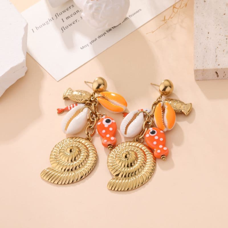 boucles doreilles fantaisie femme dorées et orange