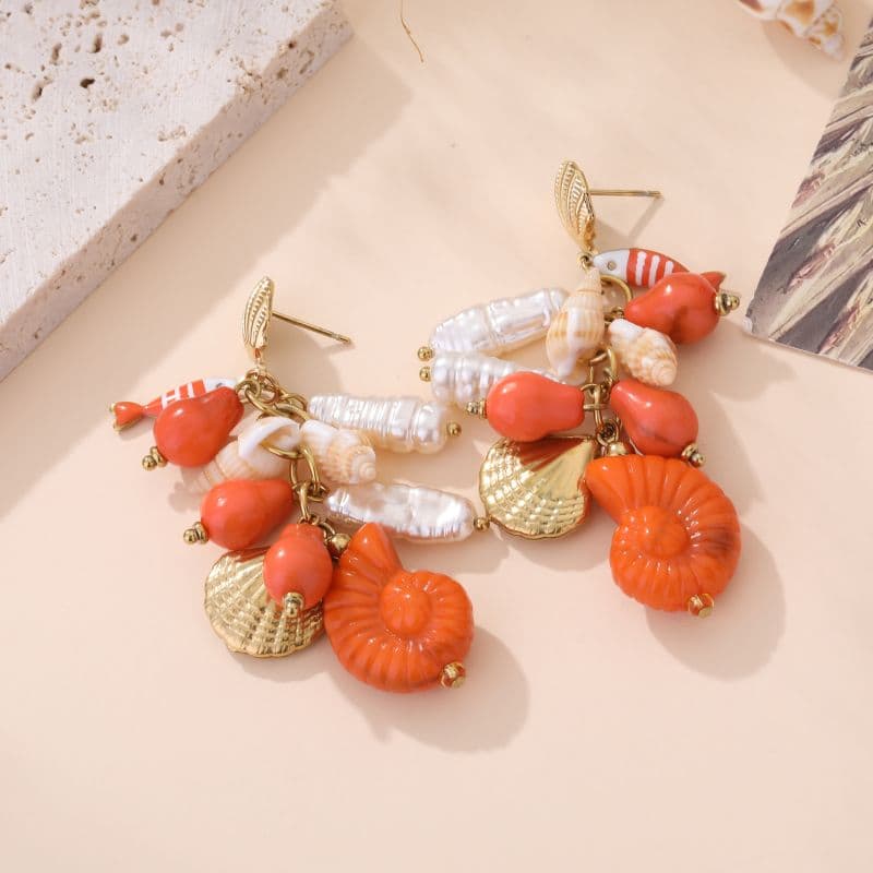 Boucles doreilles fantaisie coquillages femme dorées et orange