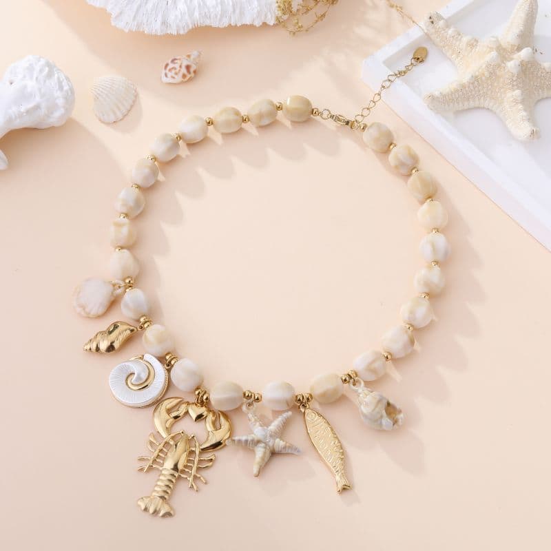 Collier porte-bonheur femme avec breloques