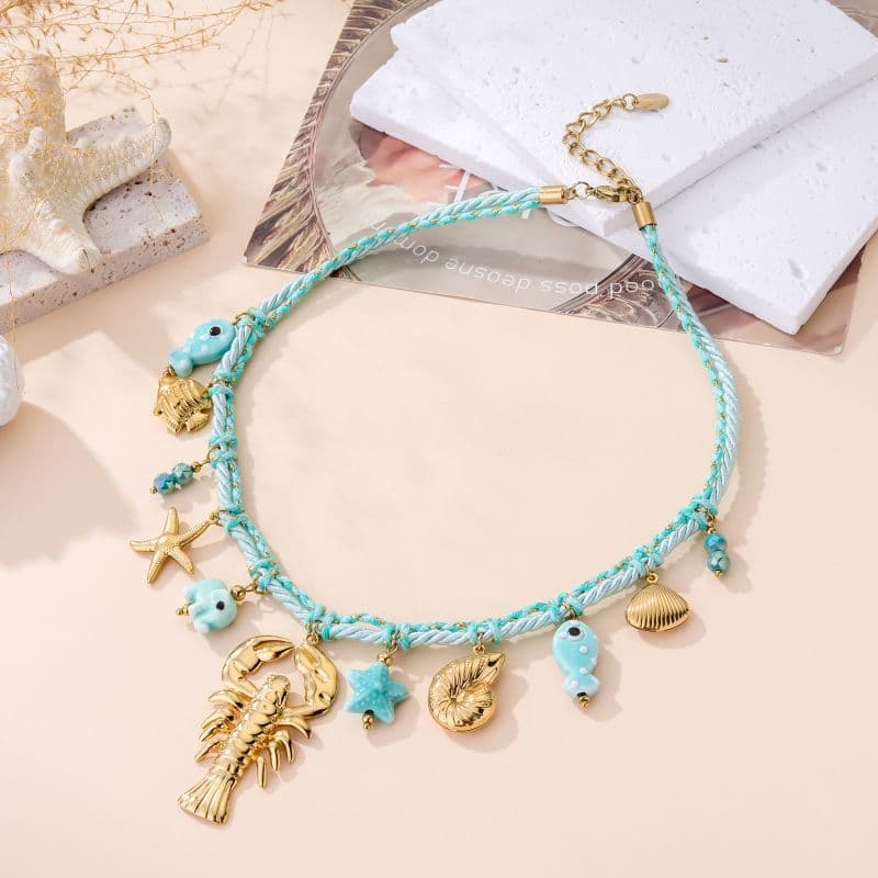 Collier breloques marine femme turquoise et doré