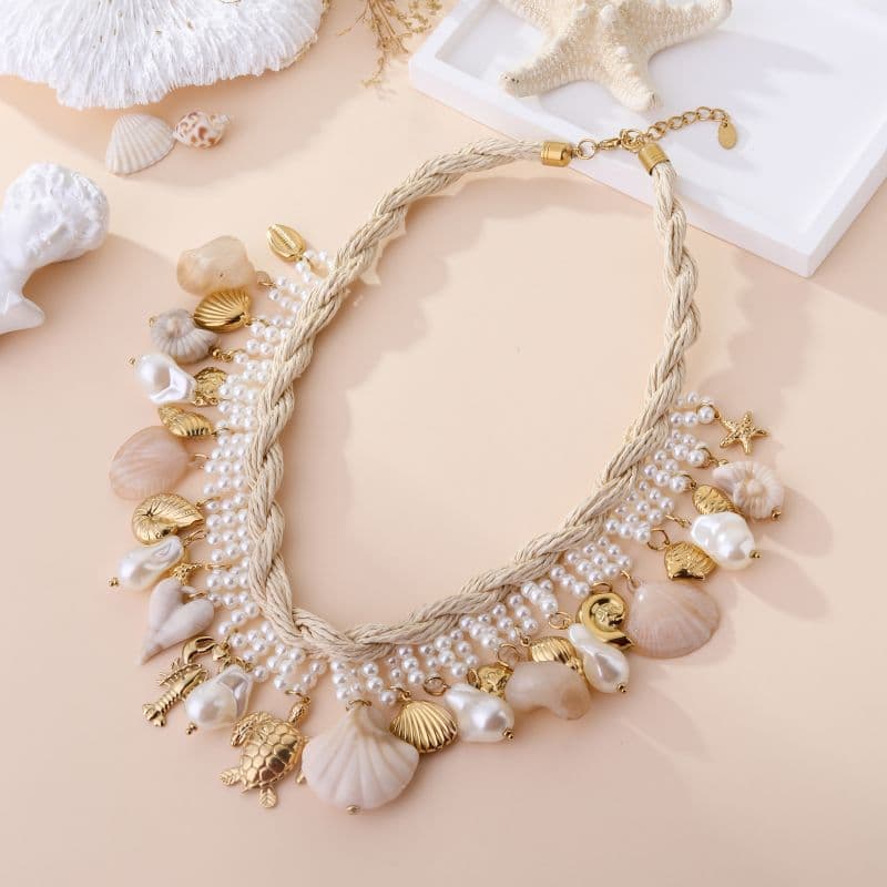 Collier charms doré marins et perles et coquillages