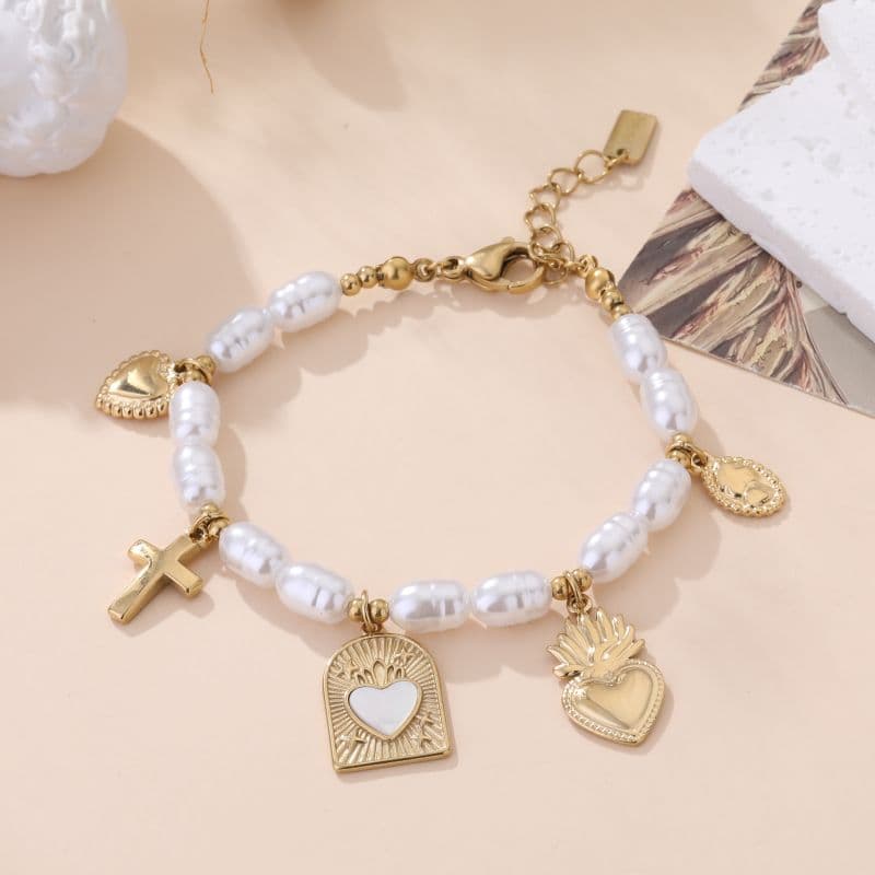 Bracelet breloque coeur dorée et blanc