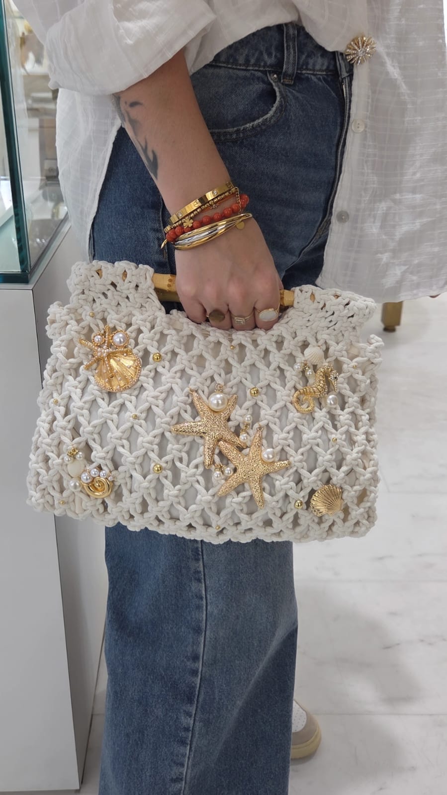 Pochette femme blanche et dorée étoile de mer