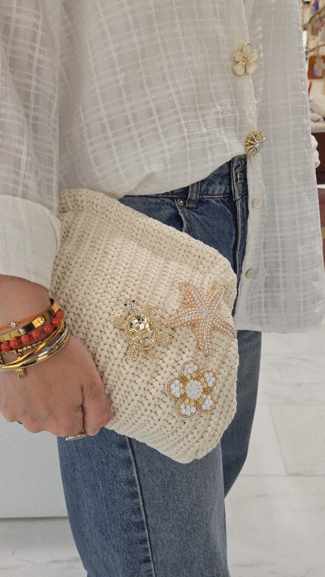 Pochette femme avec breloques &amp; coquillages