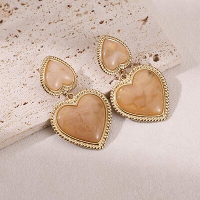 Boucles d'oreilles en forme de coeur crème