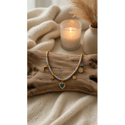 Collier porte-bonheur doré à cœur bleu et breloques