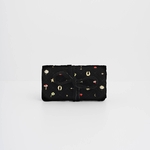 Rouleau à bijoux en velours noir matelassé avec motif brodé tendance