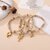 Bracelet breloque homard style haute fantaisie lot de 3 beige et blanc