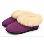 Paire de chaussons fourrés en peau de mouton violet pour femme