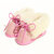 Chaussons bébé fourrés en peau de mouton rose