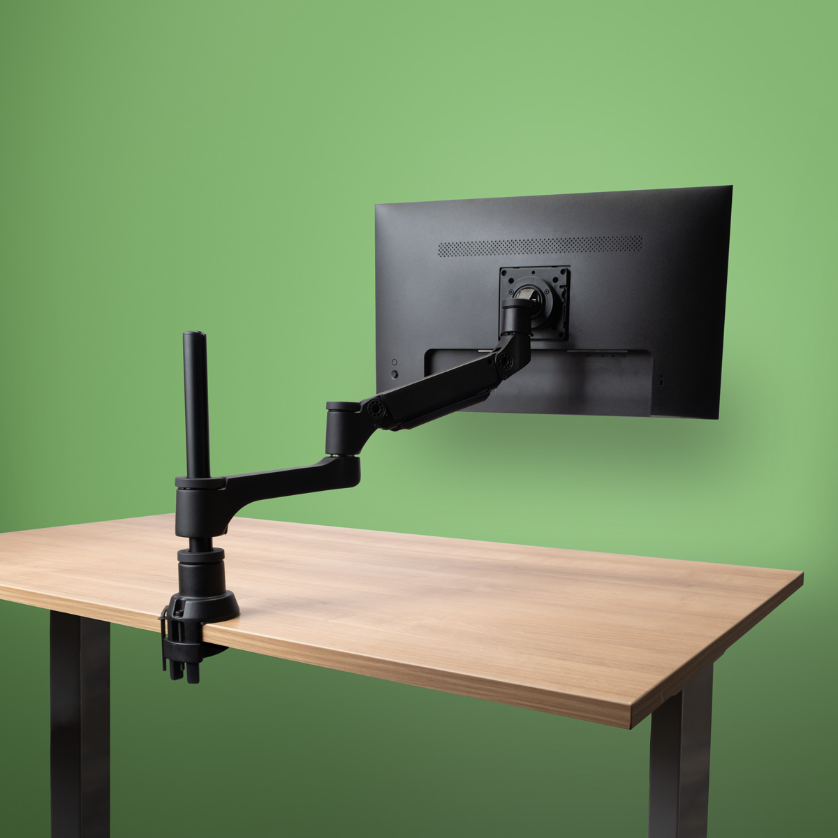 bras-ecran-ergonomique-ressort-gaz-caparo-en-situation-sur-bureau