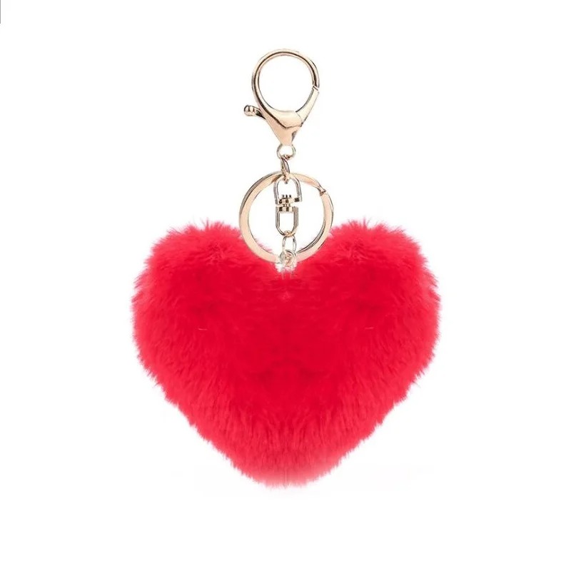 Traceur GPS dissimulée dans un porte clé coeur en peluche de couleur rouge
